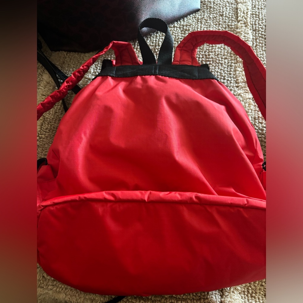 Lesportsac Red Nylon Backpack with Black Trim and Front Pockets - Picture 2 of 8